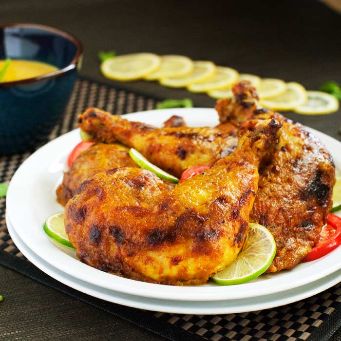 Ayam Percik, a popular Malaysian dish. Roasted chicken marinated in ...